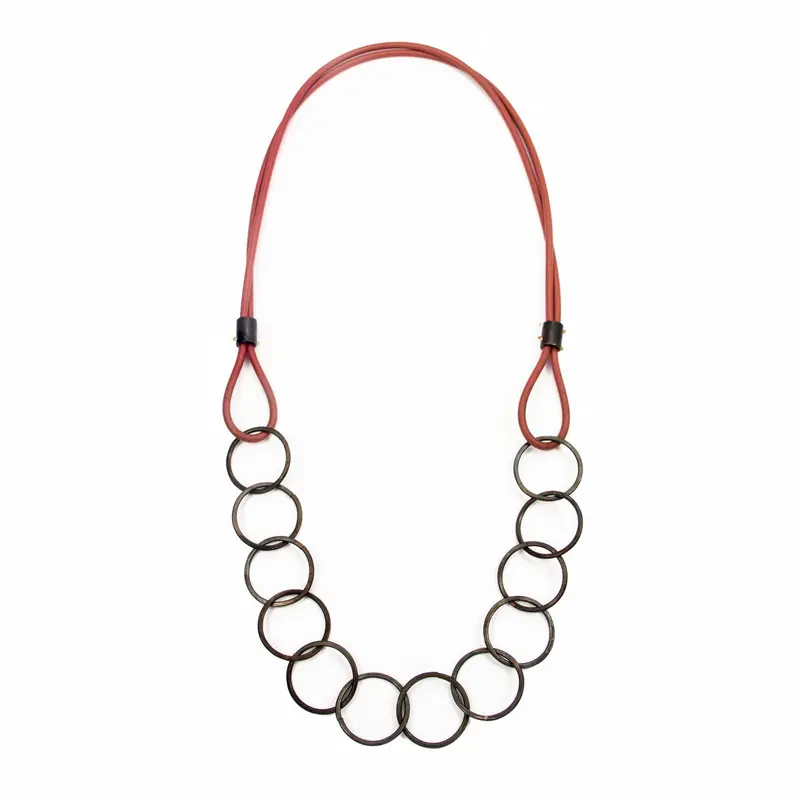 Blackened Steel Pendant with Red Silicone Accents