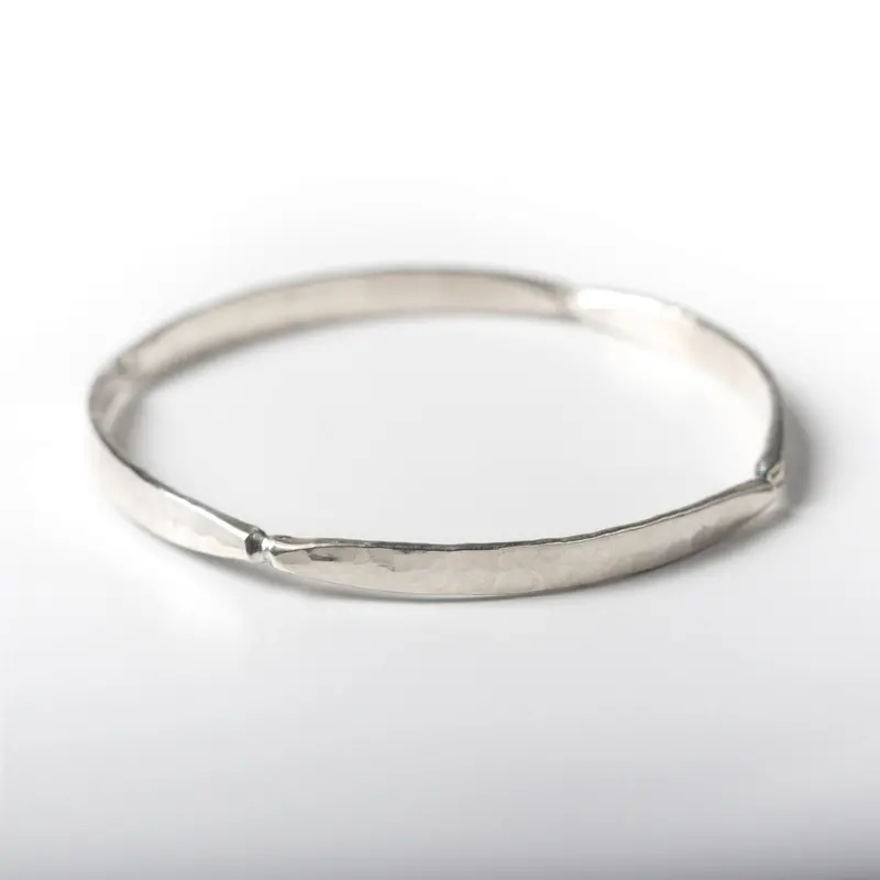 Forged Four-Faceted Sterling Silver Bangle