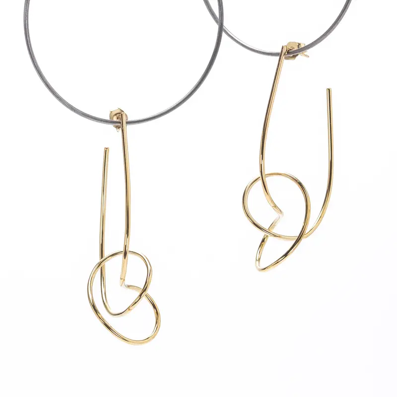 Vertical Knot Hoop Earrings – Modern Geometric Metal Design